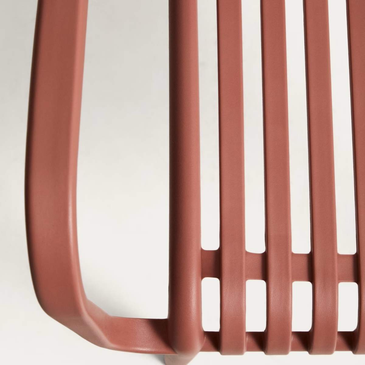 Kave Home Isabellini stackable outdoor chair in terracotta