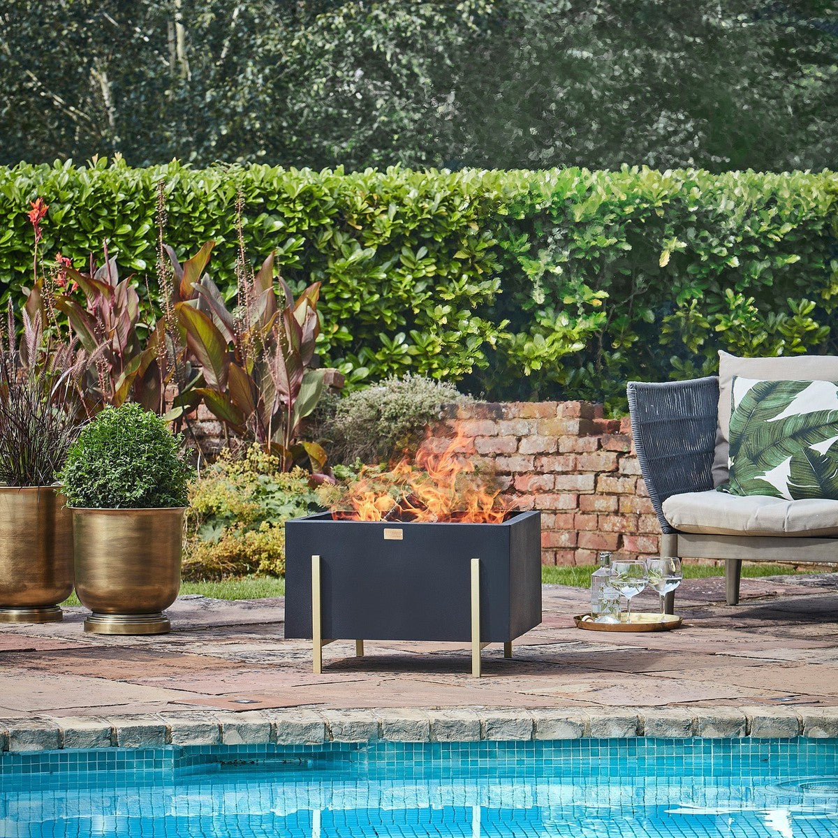 Ivyline Outdoor Orion Fire Pit in Black/Antique Gold Matt