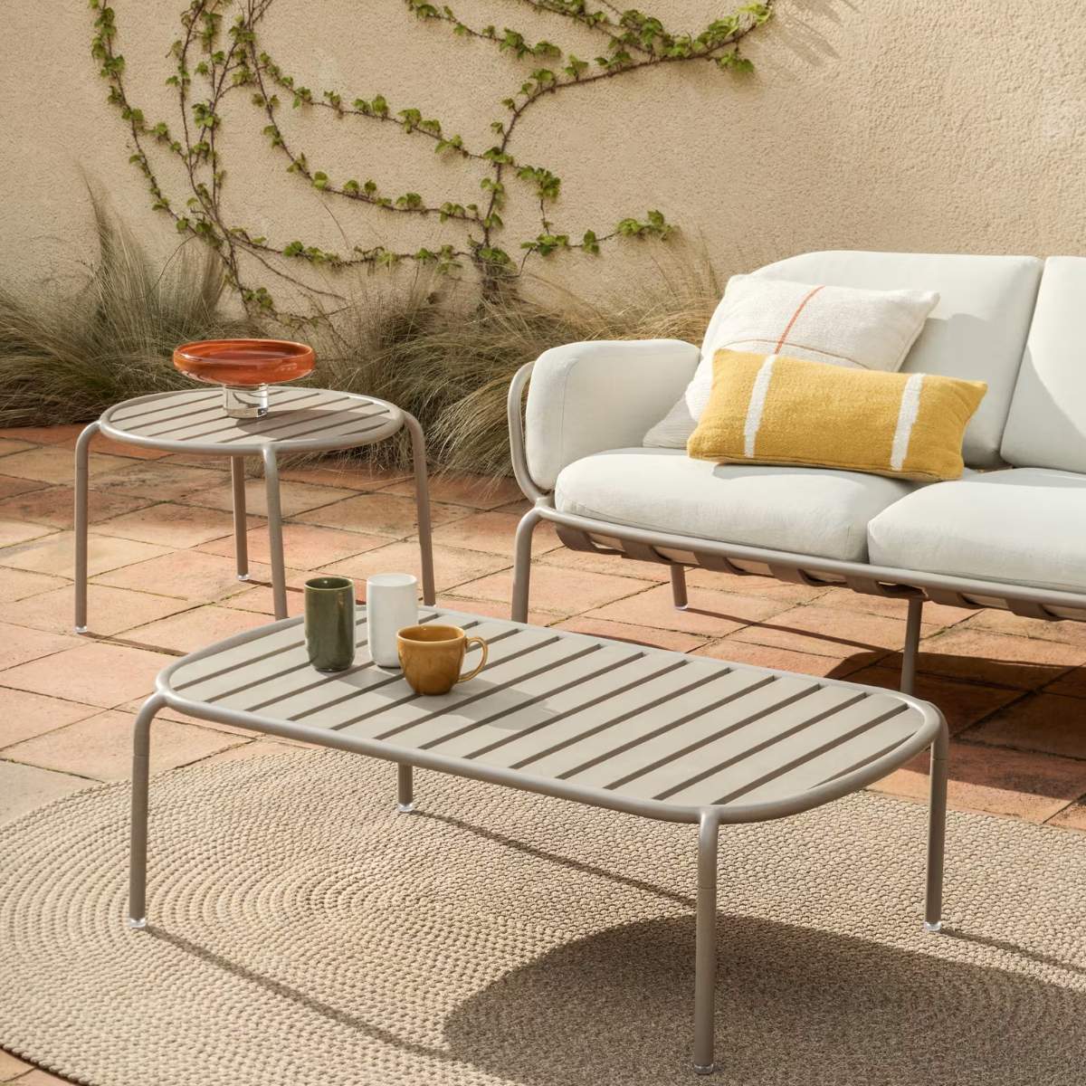 Kave Home Joncols outdoor coffee table in aluminium with taupe painted finish Ø 113 x 65cm