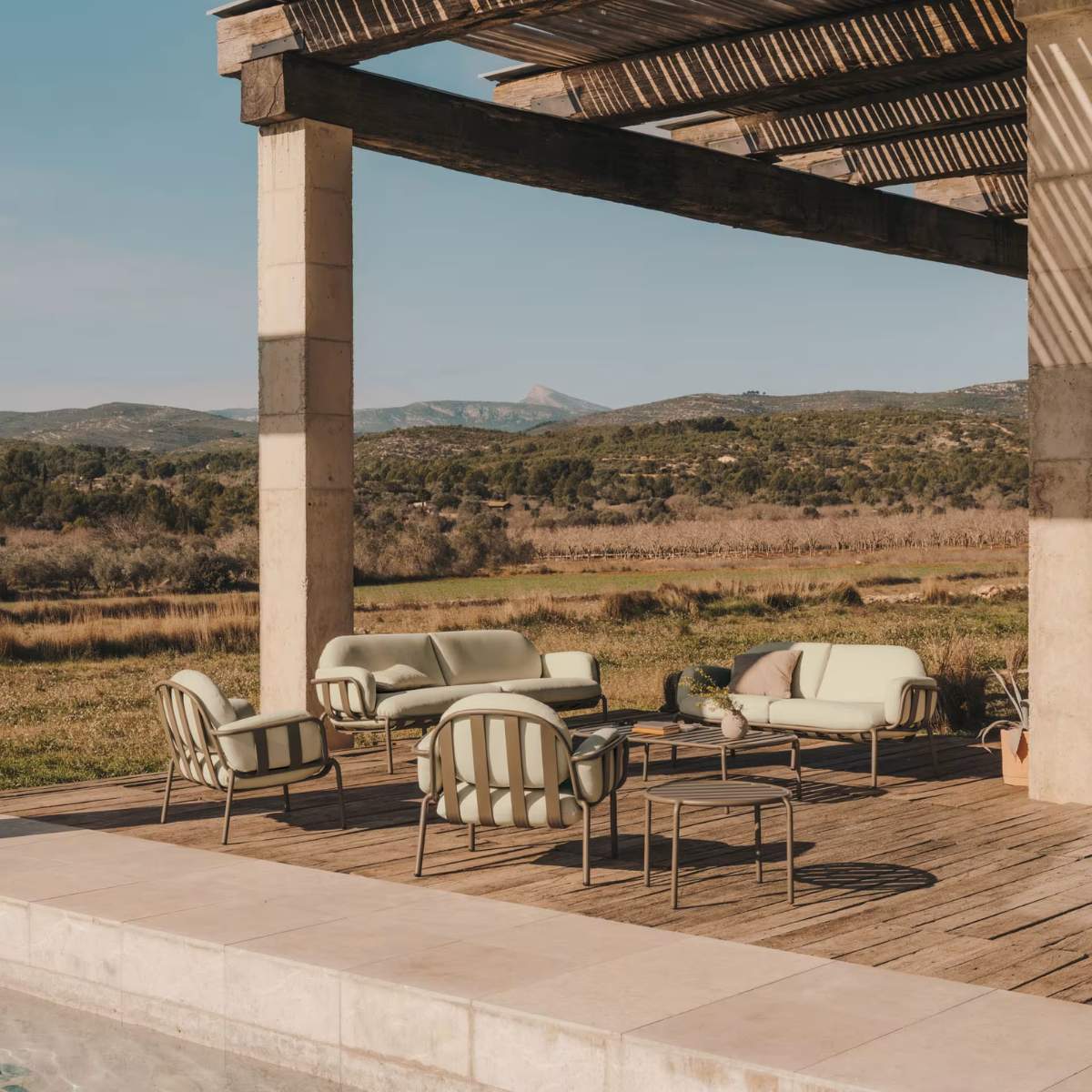 Kave Home Joncols outdoor coffee table in aluminium with taupe painted finish Ø 113 x 65cm