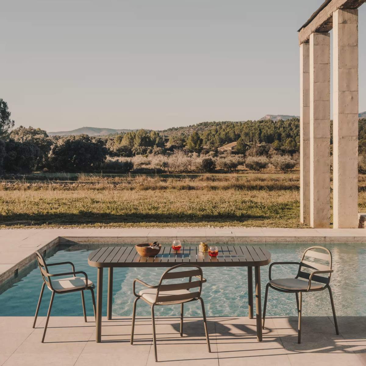 Kave Home Joncols stackable outdoor chair in aluminium with taupe painted finish