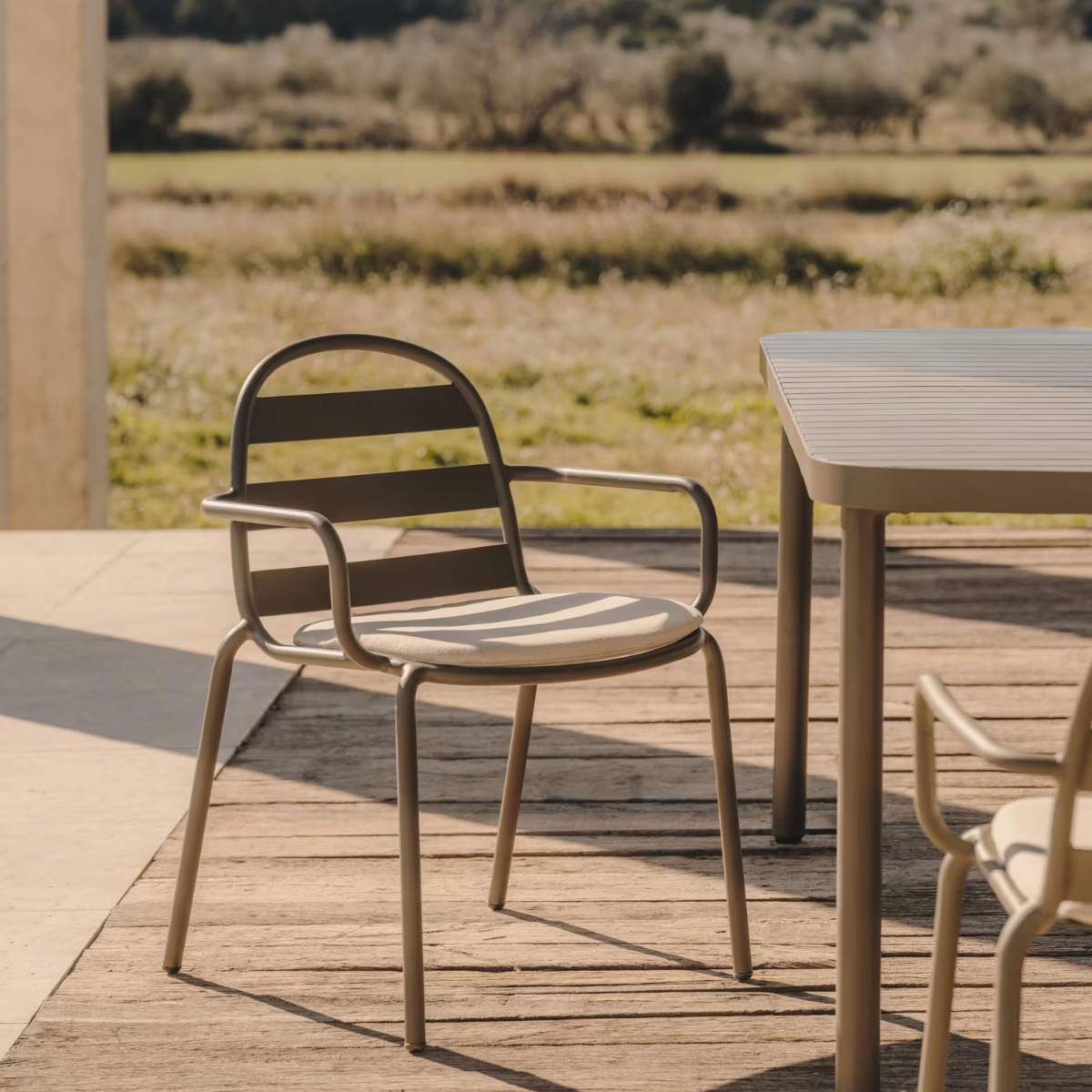 Kave Home Joncols stackable outdoor chair in aluminium with taupe painted finish