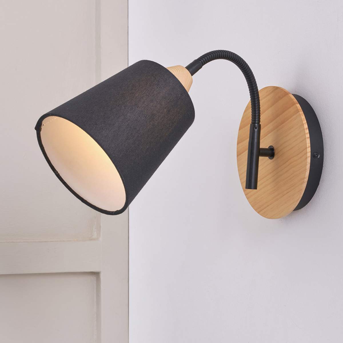 Pacific Lifestyle Juna Black Metal and Natural Wood Wall Light