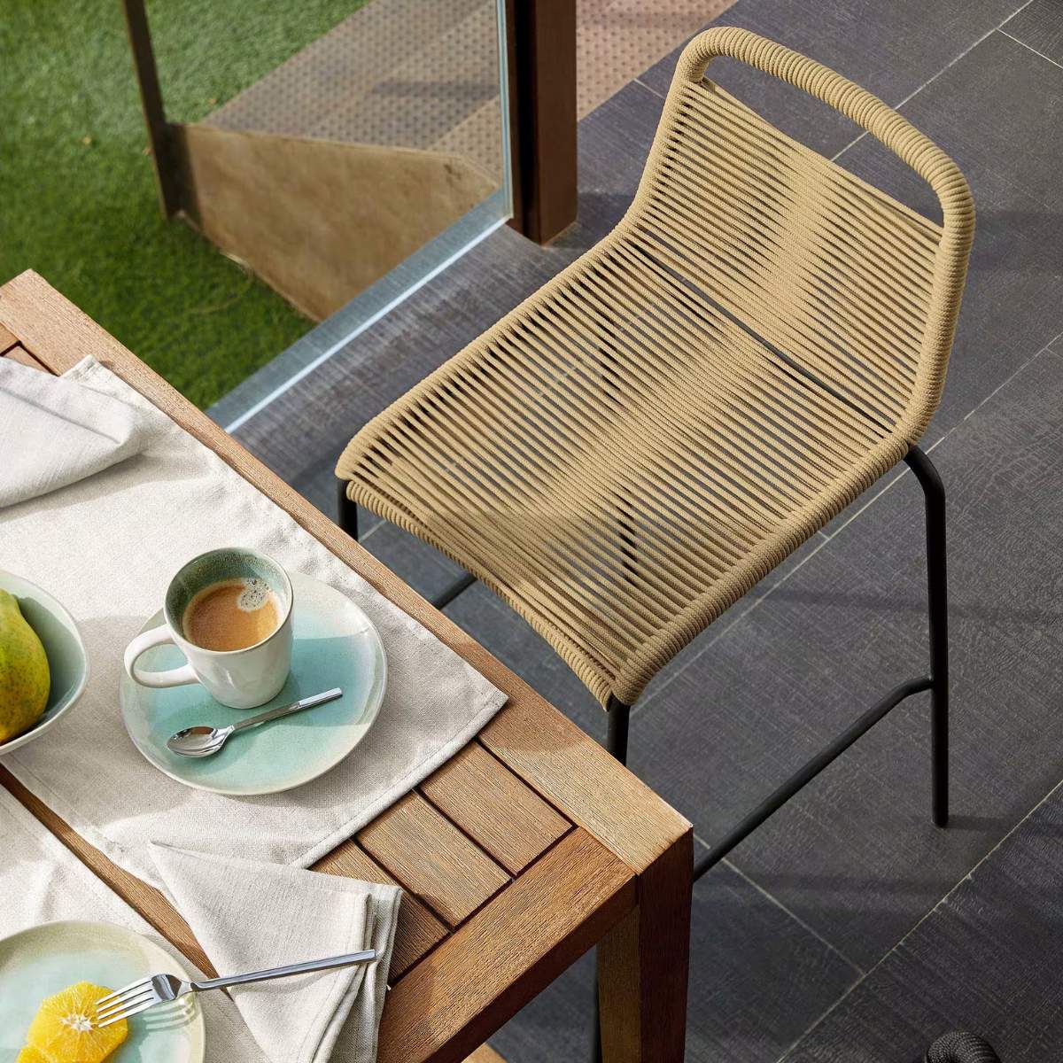 Kave Home Lambton stackable stool in brown rope and black finish steel, 62 cm