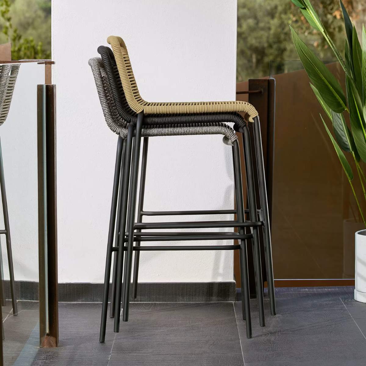 Kave Home Lambton stackable stool in brown rope and black finish steel 74 cm