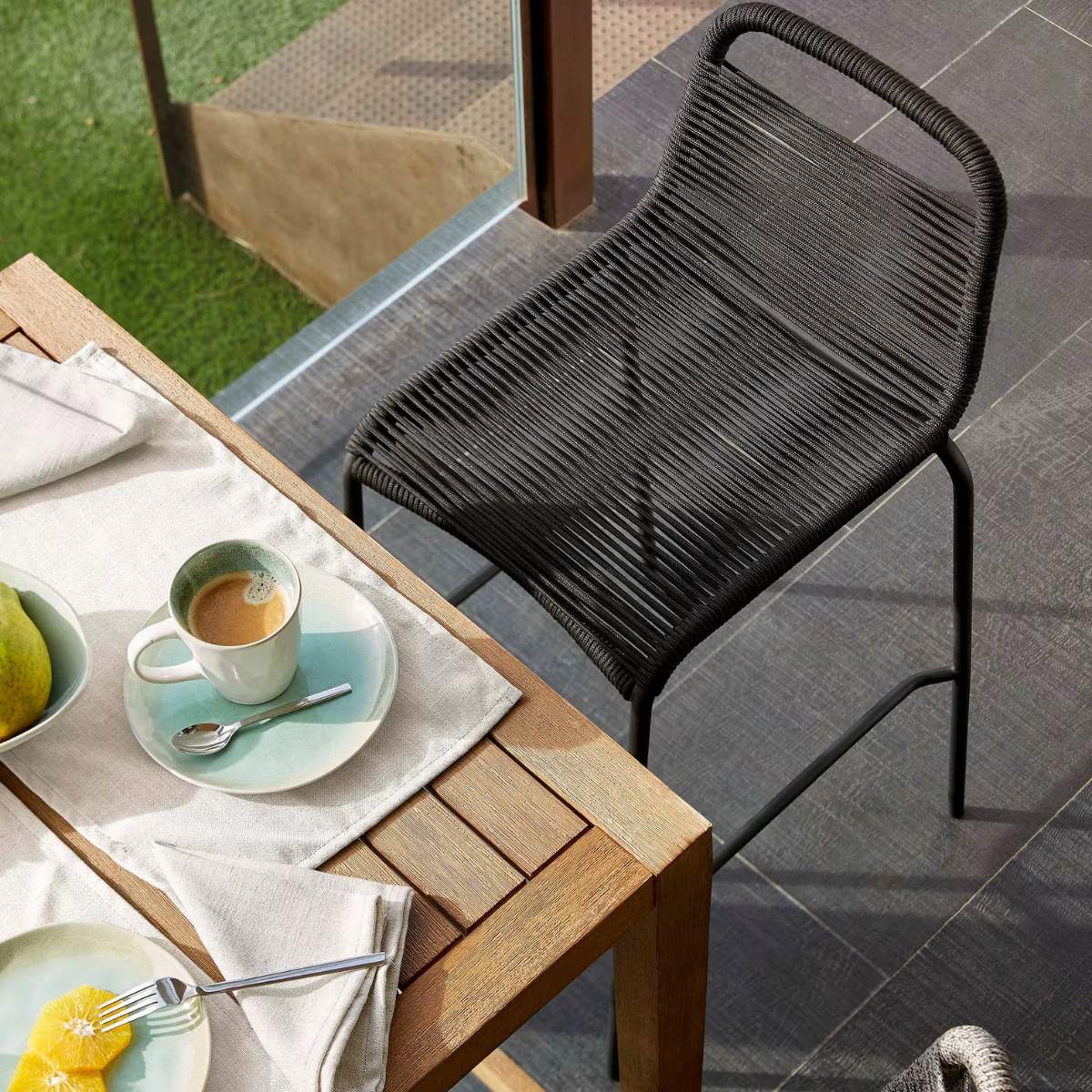 Kave Home Lambton stackable stool in brown rope and black finish steel, 62 cm