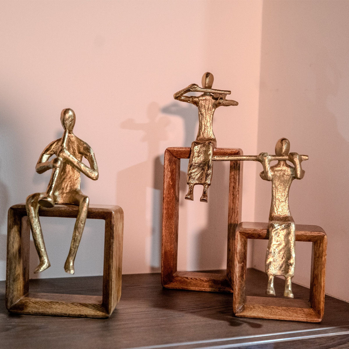 Mindy Brownes Abstract brass coloured sculptures
