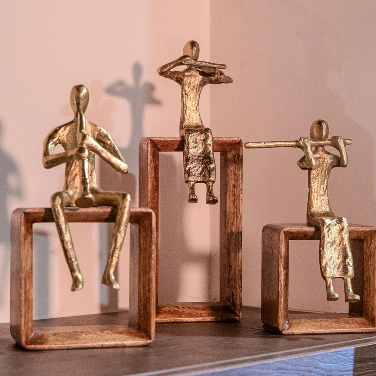 Mindy Brownes Abstract brass coloured sculptures