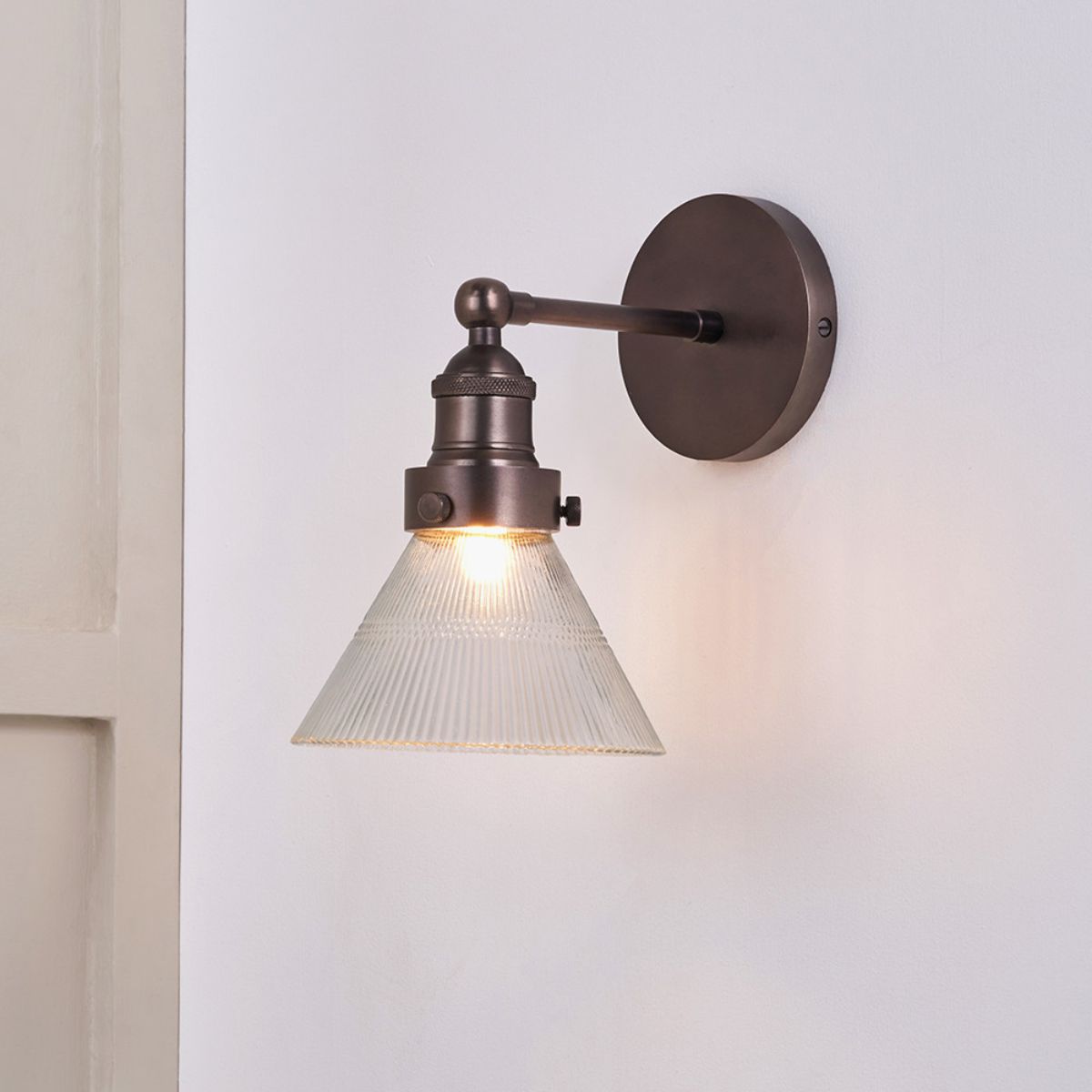 Pacific Lifestyle Lenox Conical Ribbed Glass with Antique Bronze Fitting Wall Light