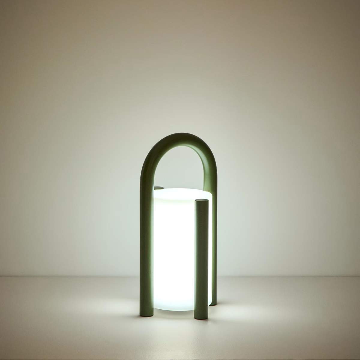 Kave Home Leros small portable table lamp in green polyethylene and steel