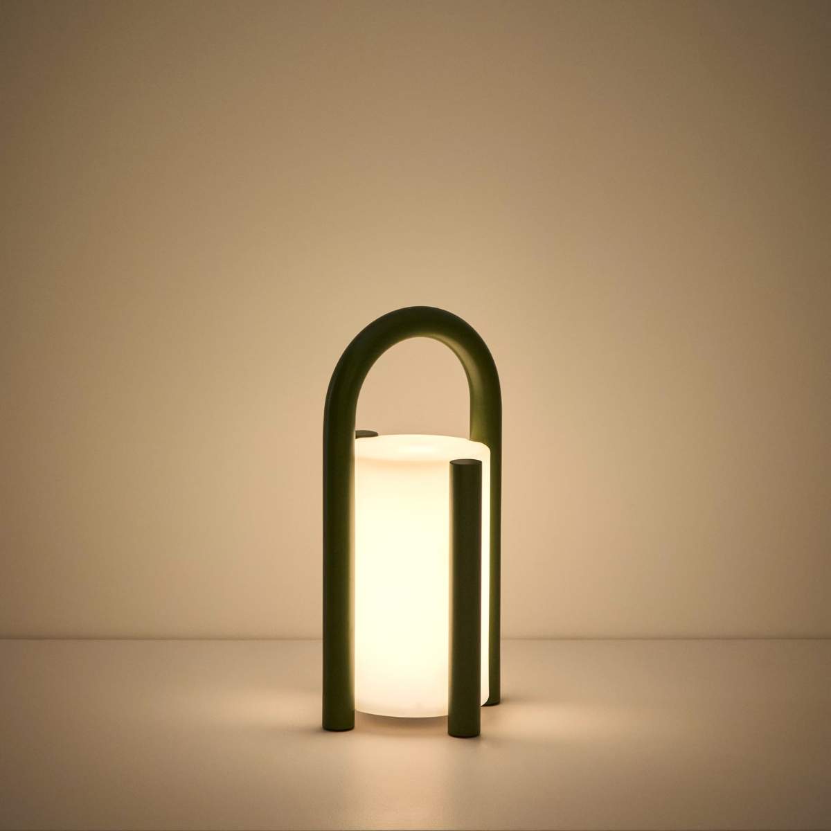 Kave Home Leros small portable table lamp in green polyethylene and steel