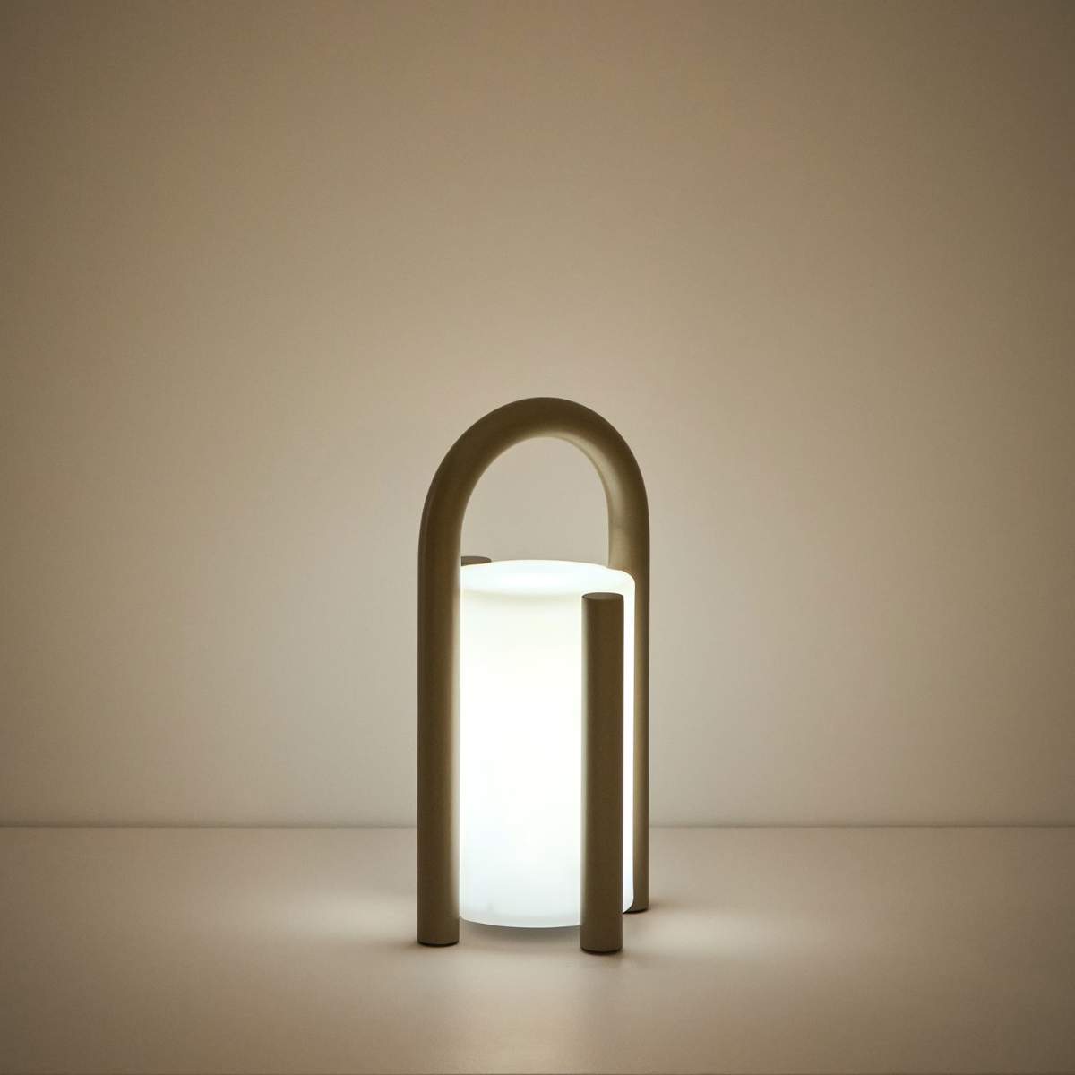 Kave Home Leros small portable table lamp in green polyethylene and steel