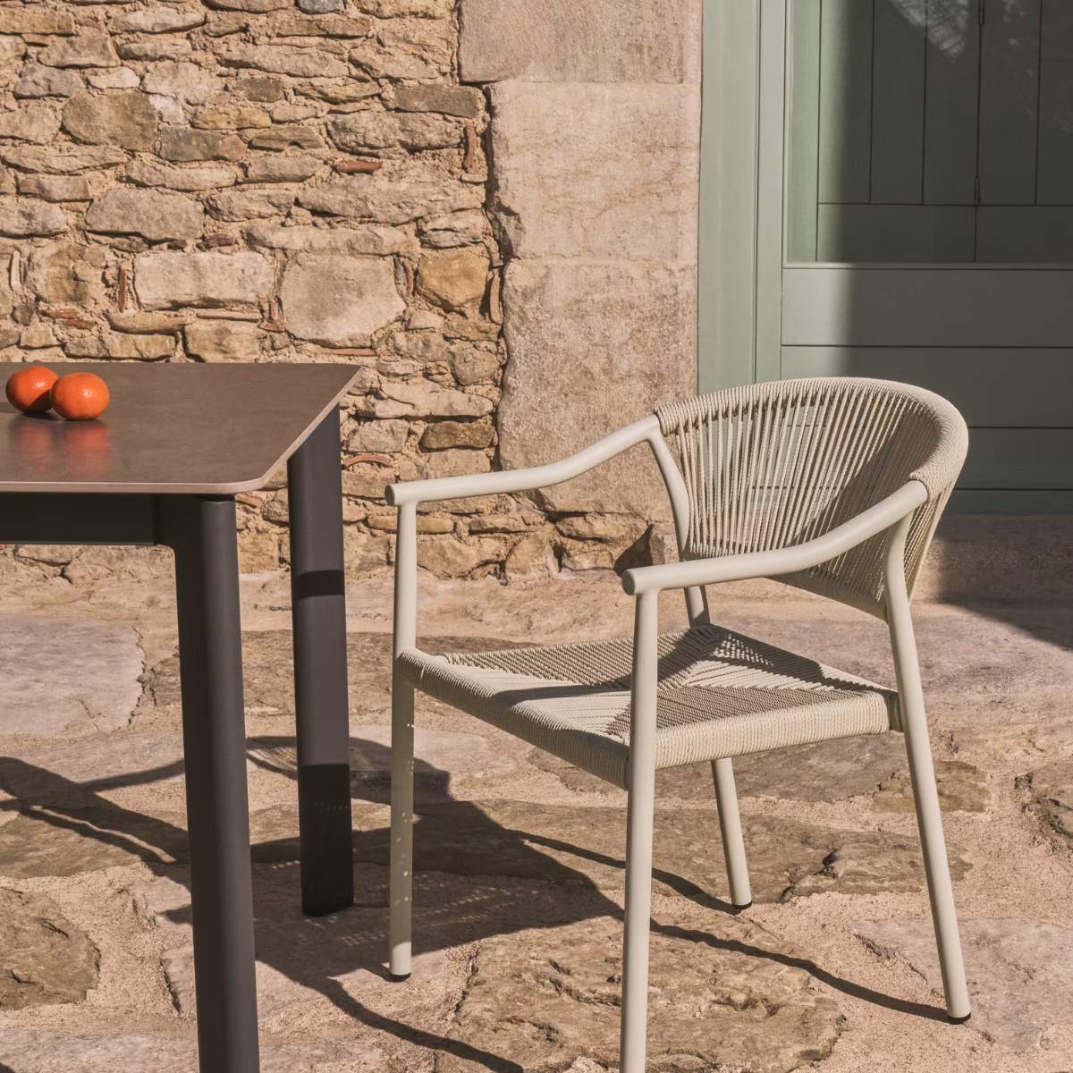 Kave Home Livadia stackable outdoor chair in ecru aluminium