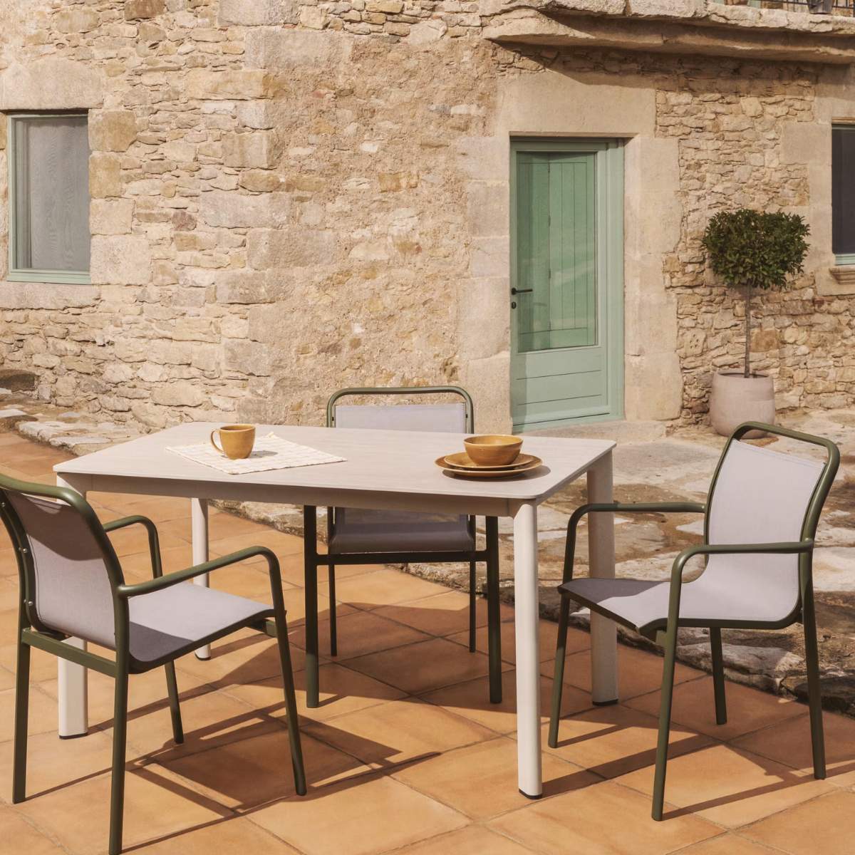 Kave Home Luri stackable chair in ecru aluminium and beige texteline