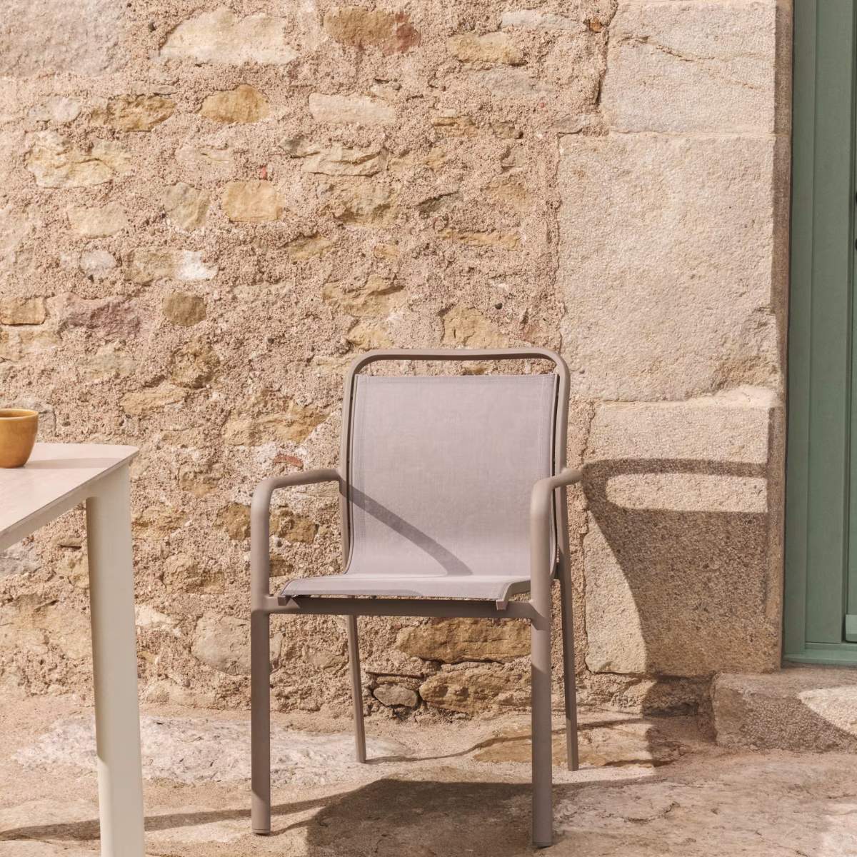 Kave Home Luri stackable chair in ecru aluminium and beige texteline