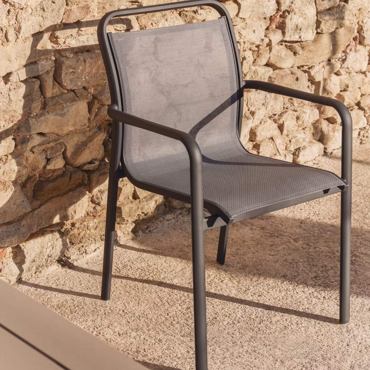 Kave Home Luri stackable chair in ecru aluminium and beige texteline