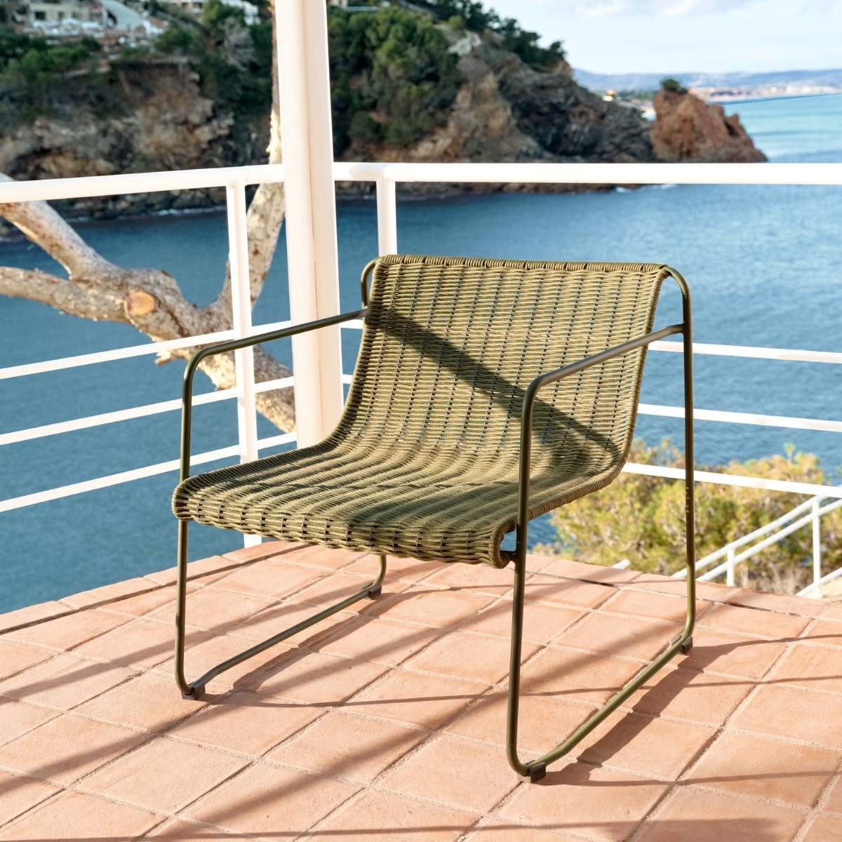 Kave Home Maurina stackable armchair in green galvanised steel and green rope cord