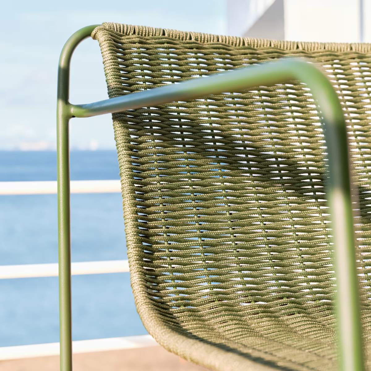 Kave Home Maurina stackable armchair in green galvanised steel and green rope cord