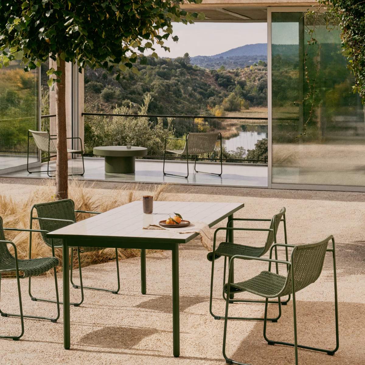 Kave Home Maurina outdoor table in green galvanised steel with green tiles 182 x 91cm