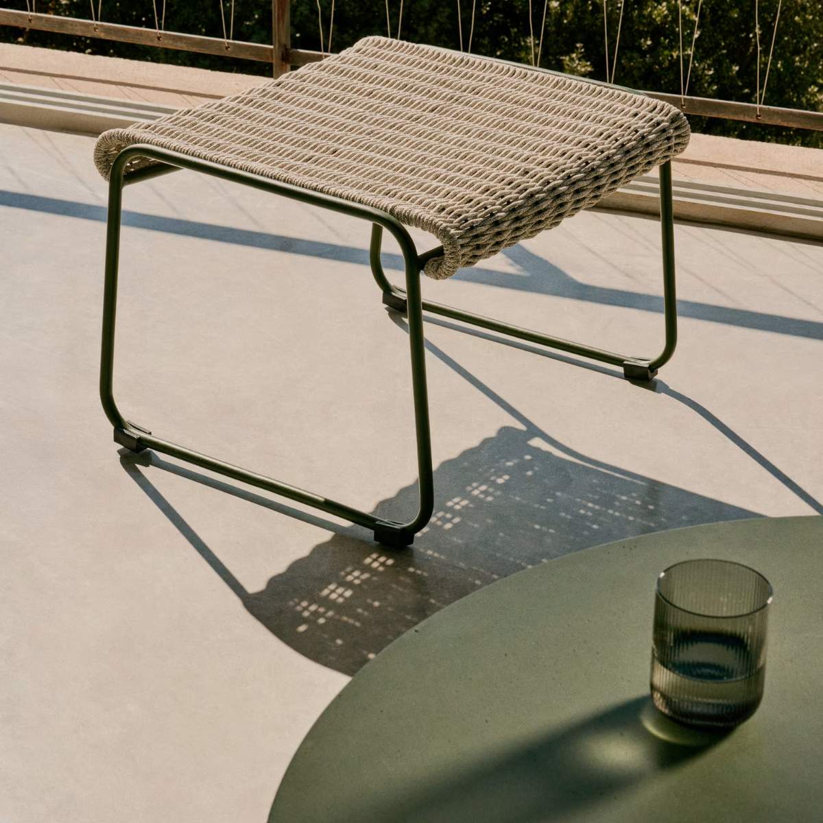 Kave Home Maurina footrest in green galvanised steel and green rope cord 58 x 52.5cm