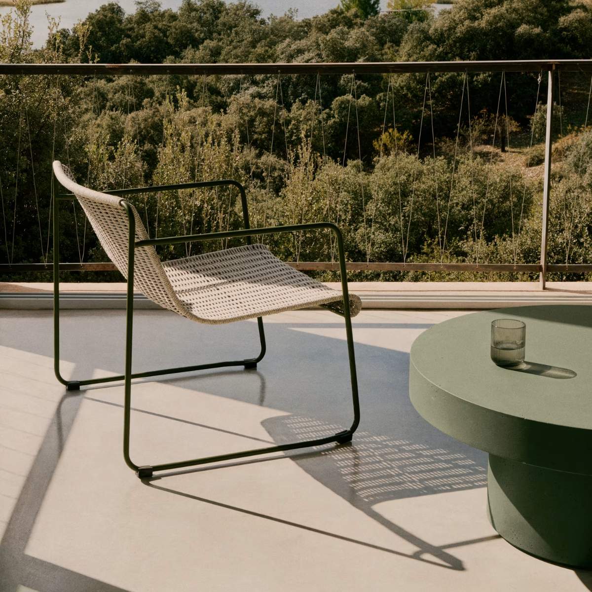 Kave Home Maurina stackable armchair in green galvanised steel and green rope cord