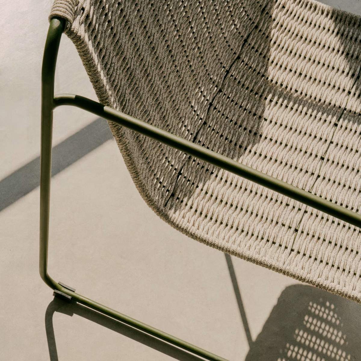 Kave Home Maurina stackable armchair in green galvanised steel and green rope cord