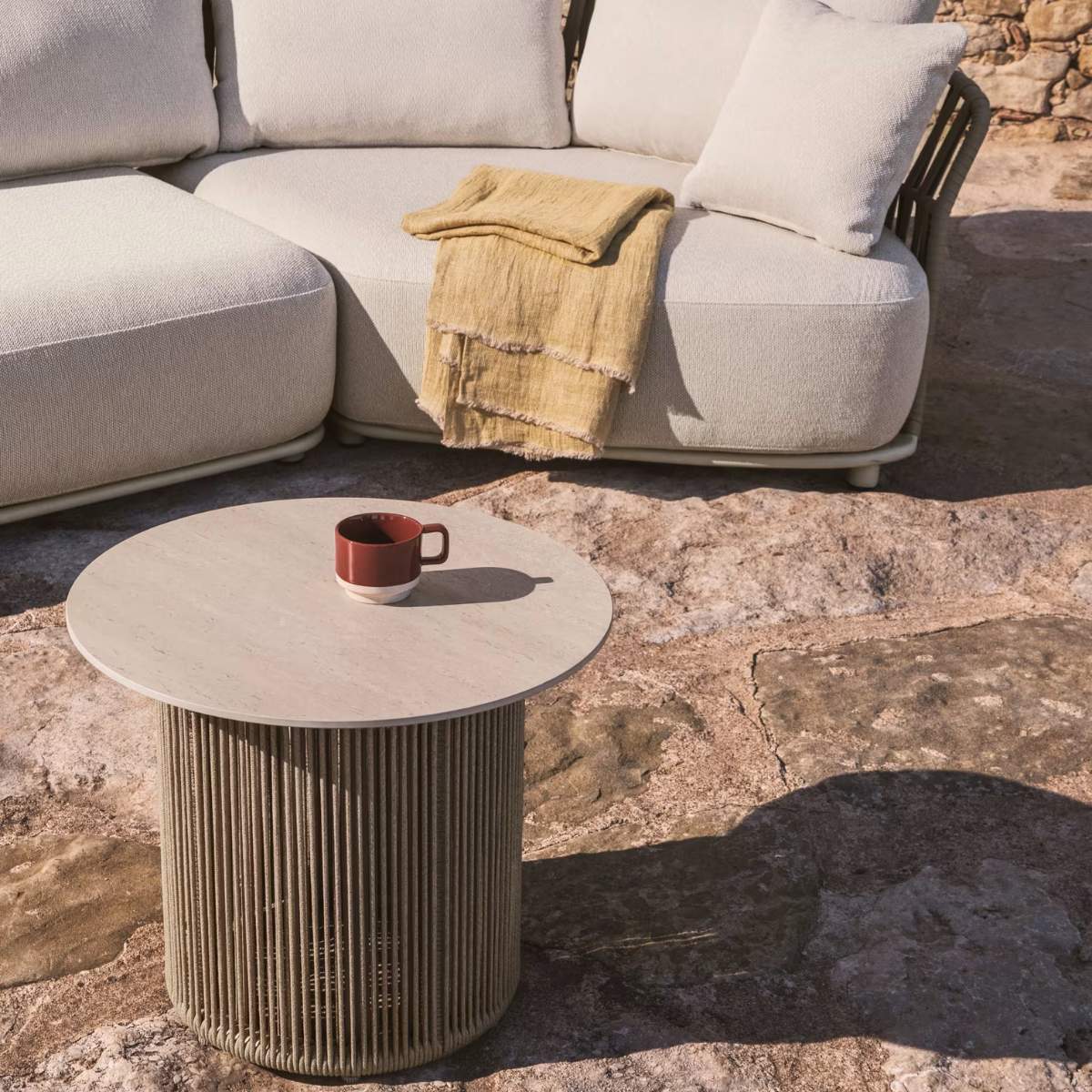 Kave Home Orosei outdoor side table in sintered stone, aluminium and ecru rope Ø 55 cm