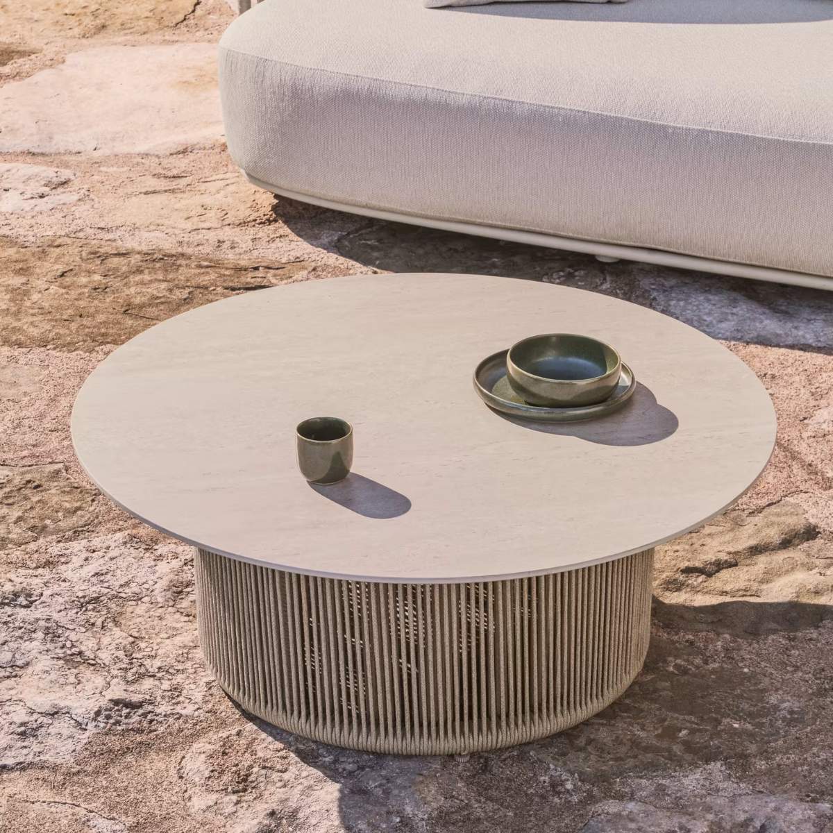 Kave Home Orosei outdoor coffee table in sintered stone, ecru aluminium and beige rope Ø 90 cm