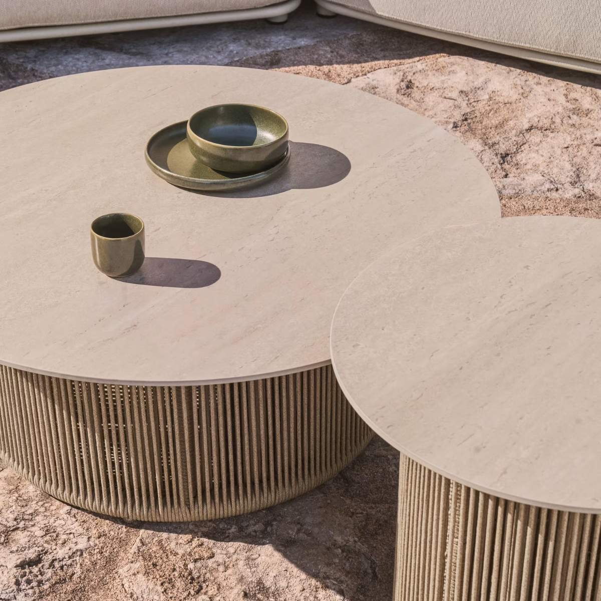 Kave Home Orosei outdoor coffee table in sintered stone, ecru aluminium and beige rope Ø 90 cm