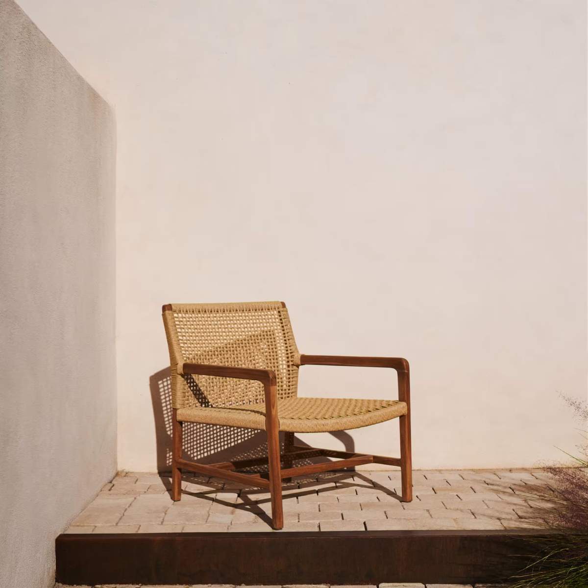 Kave Home Sabolla armchair made of solid teak wood in a black finish