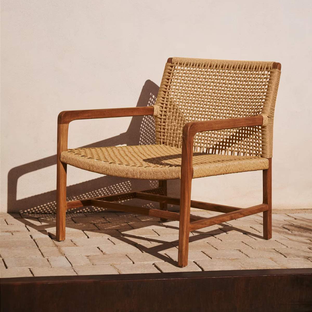 Kave Home Sabolla armchair made of solid teak wood in a black finish