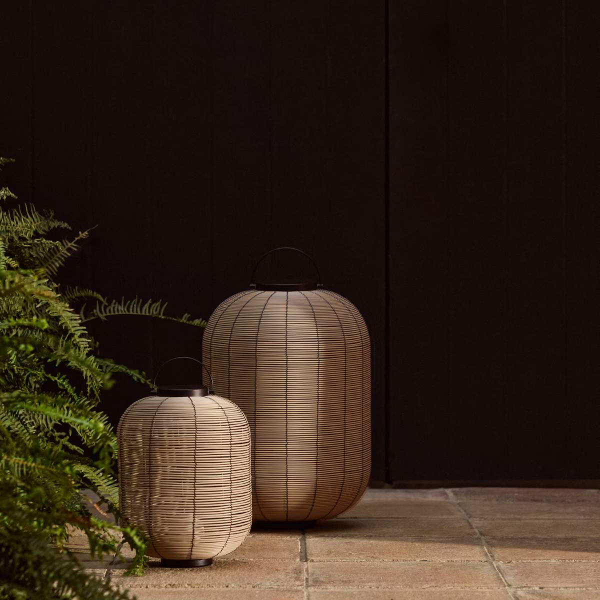 Kave Home Saranella portable LED table lamp in light grey synthetic rattan