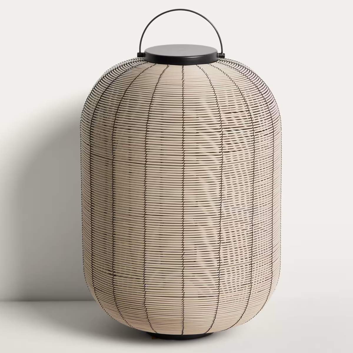 Kave Home Saranella portable LED table lamp in light grey synthetic rattan