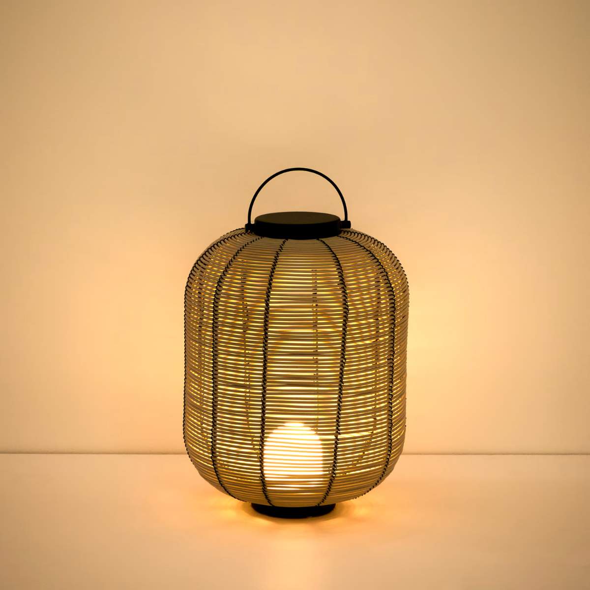 Kave Home Saranella small portable LED table lamp in light grey synthetic rattan