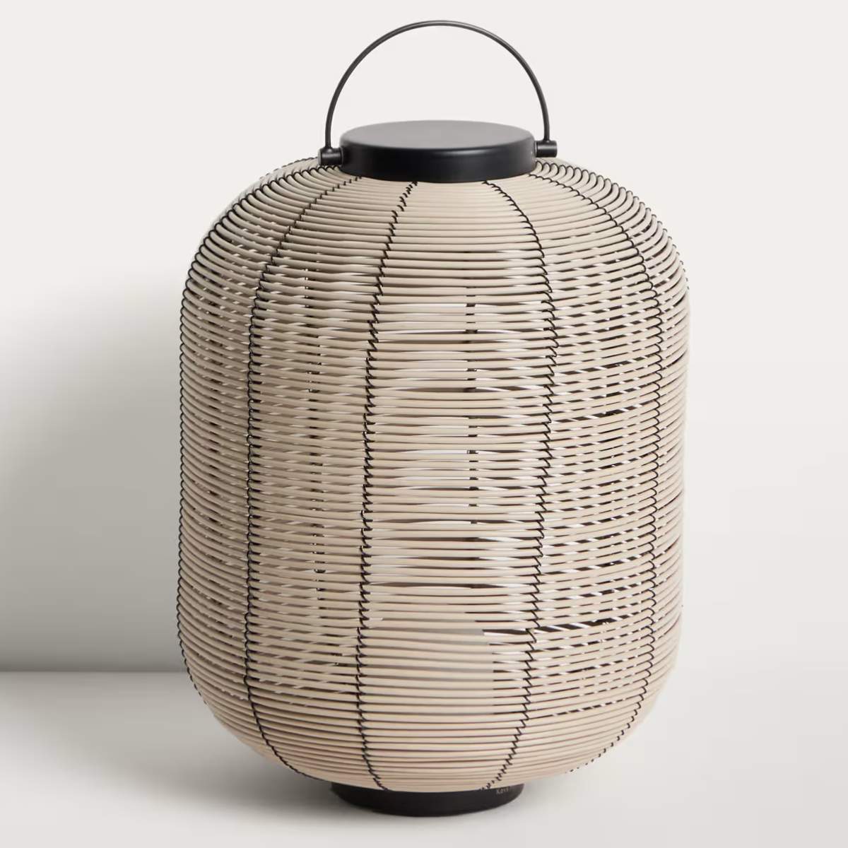 Kave Home Saranella small portable LED table lamp in light grey synthetic rattan