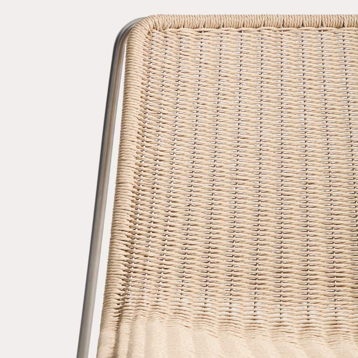Kave Home Tavari stackable armchair in beige synthetic rope cord and AISI 304 stainless steel with brushed finish