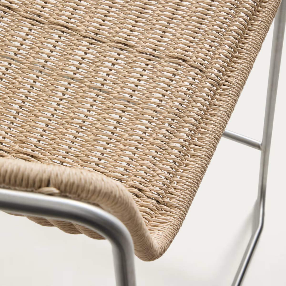 Kave Home Tavari stackable stool in beige synthetic rope cord and AISI 304 stainless steel with brushed finish 65 cm