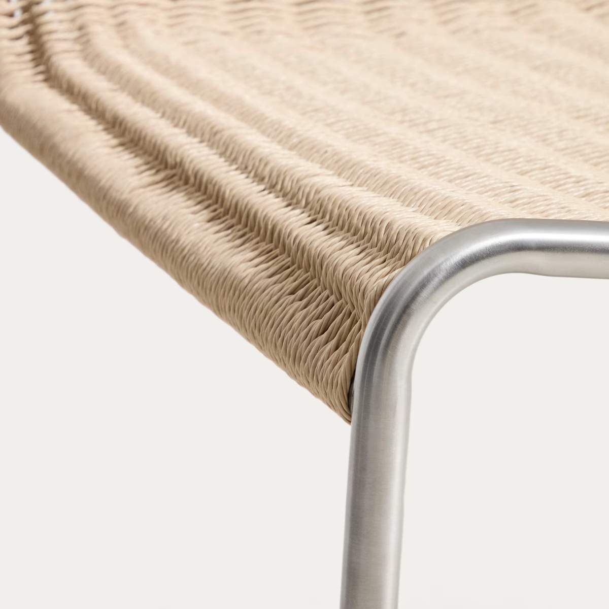 Kave Home Tavari stackable armchair in beige synthetic rope cord and AISI 304 stainless steel with brushed finish