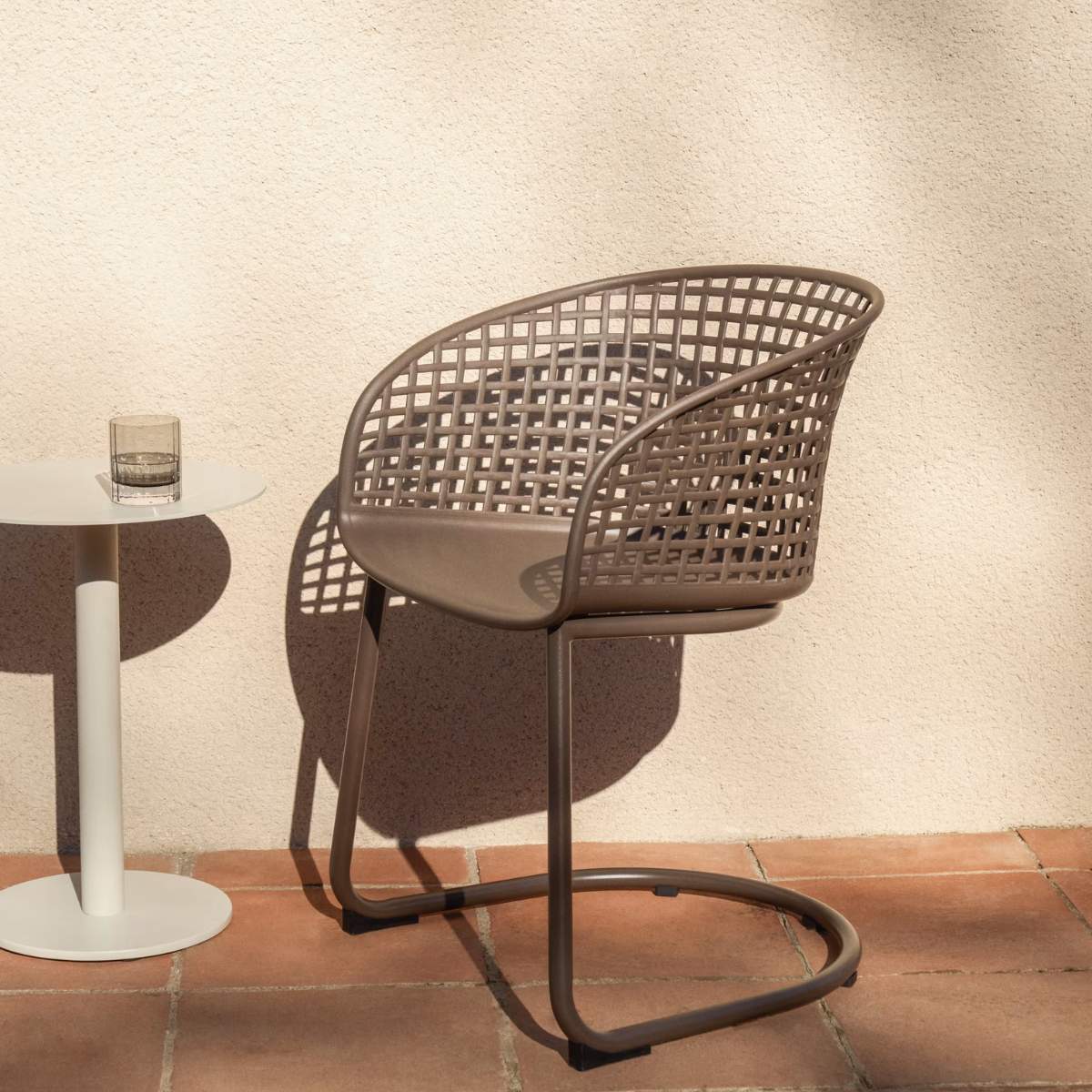 Kave Home Tenaro green plastic outdoor chair with steel structure