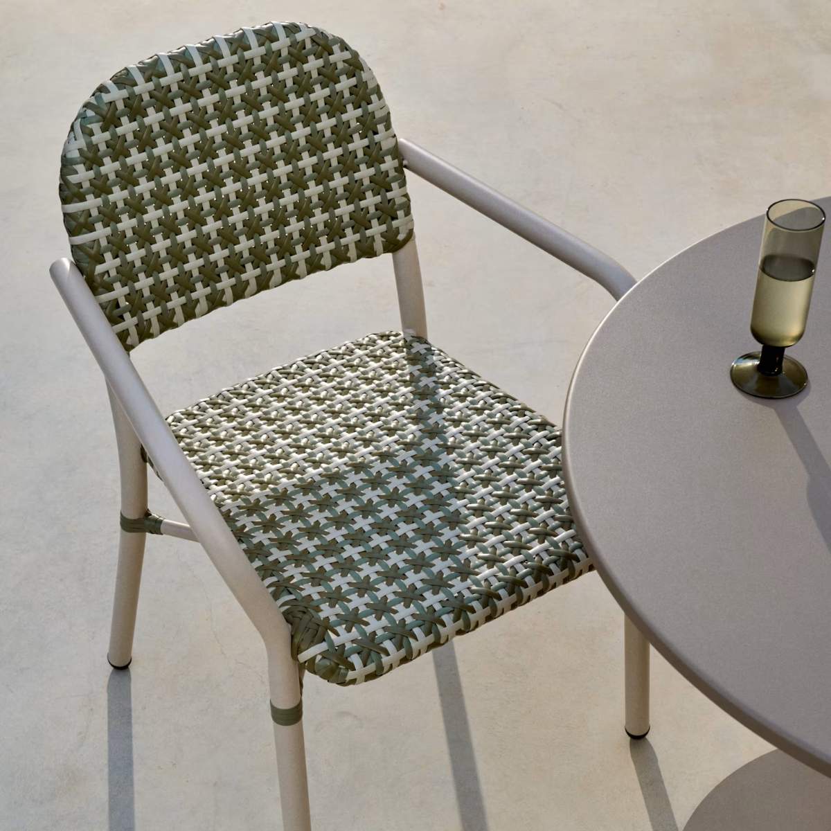Kave Home Tuccia stackable chair in aluminium and synthetic rattan in green and beige