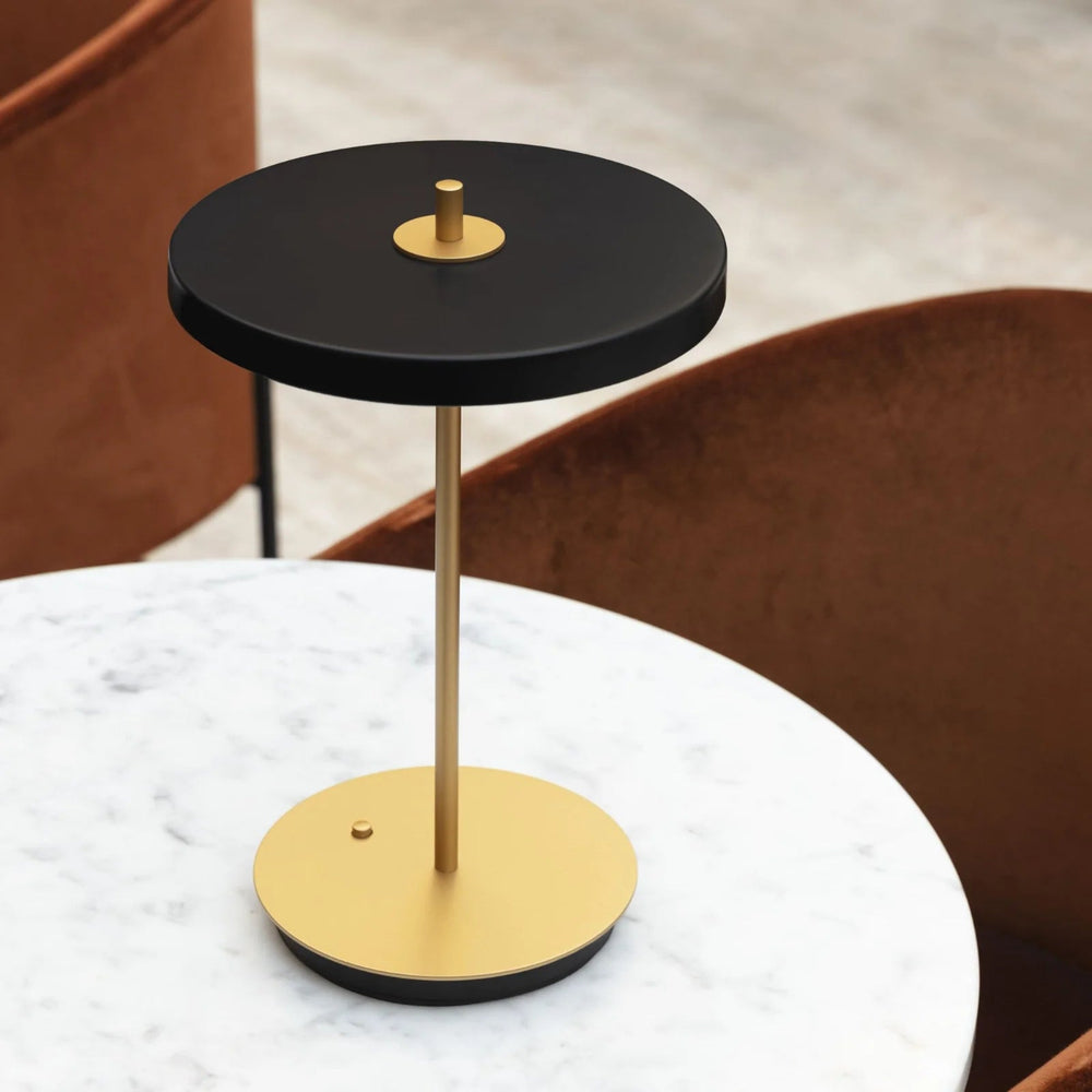 Umage Asteria Move Portable Table Lamp In Black lifestyle