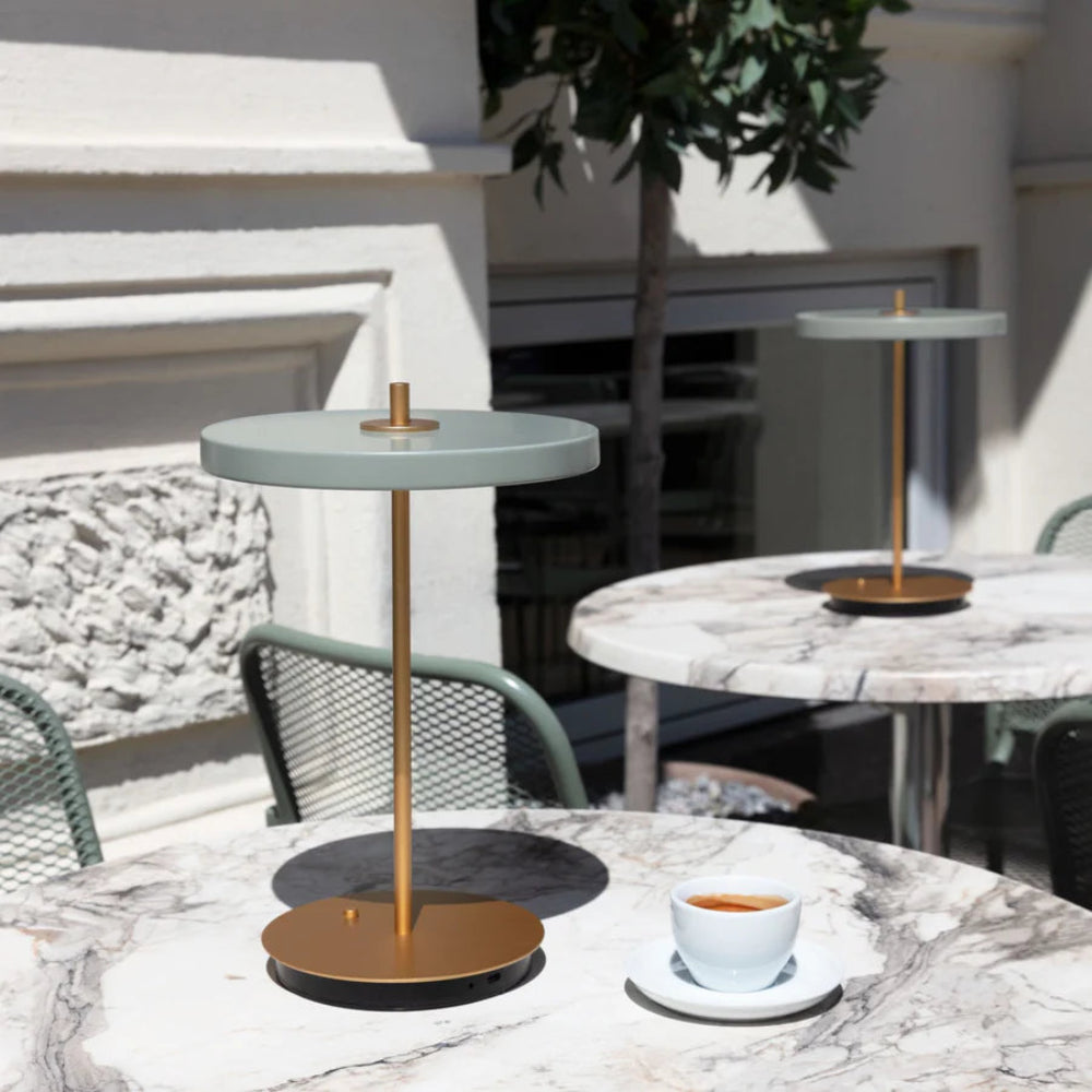 Umage Asteria Move Portable Table Lamp In Nuance Olive And Brass lifestyle 6