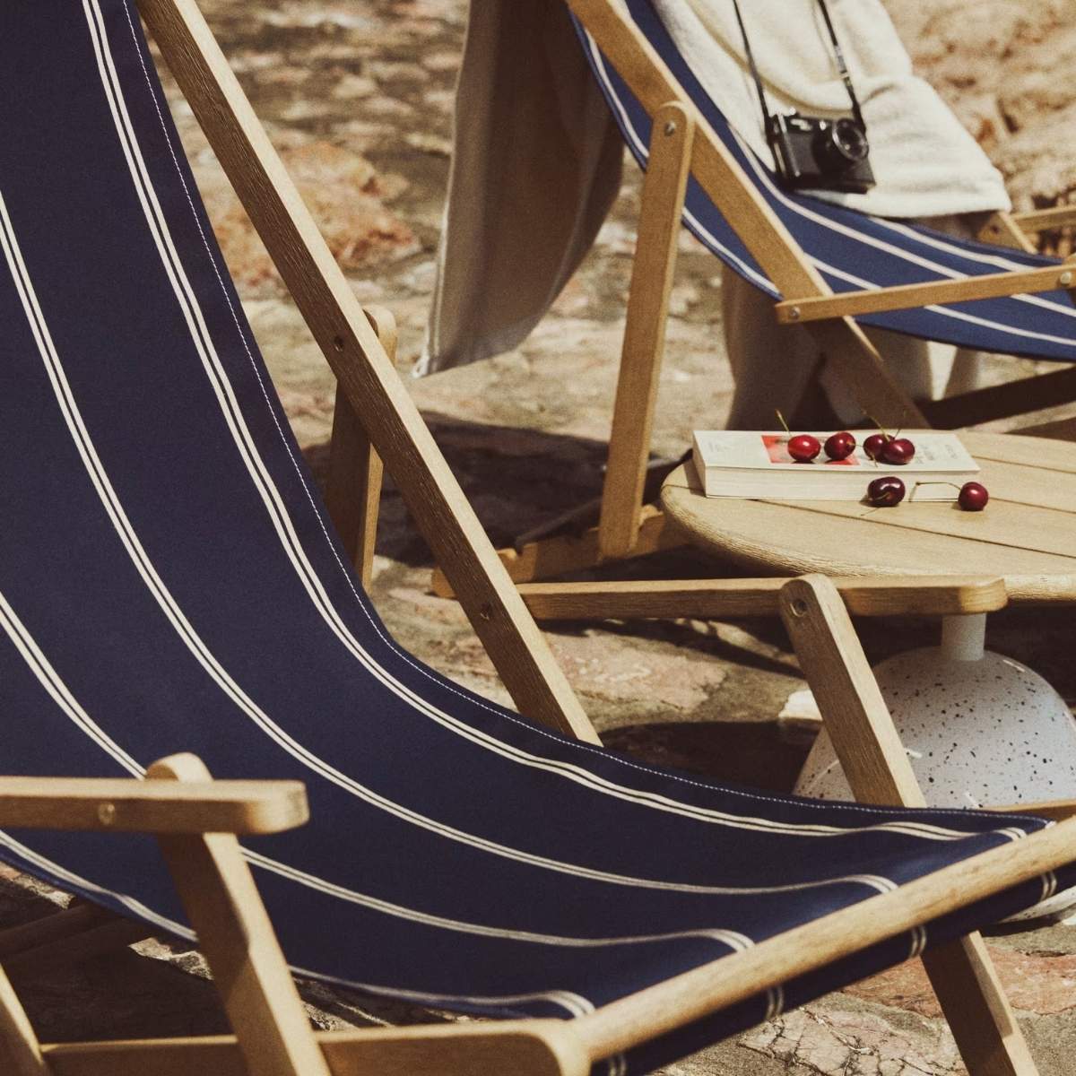 Kave Home Vilara brown and beige striped outdoor folding deck chair made of FSC 100% solid acacia wood