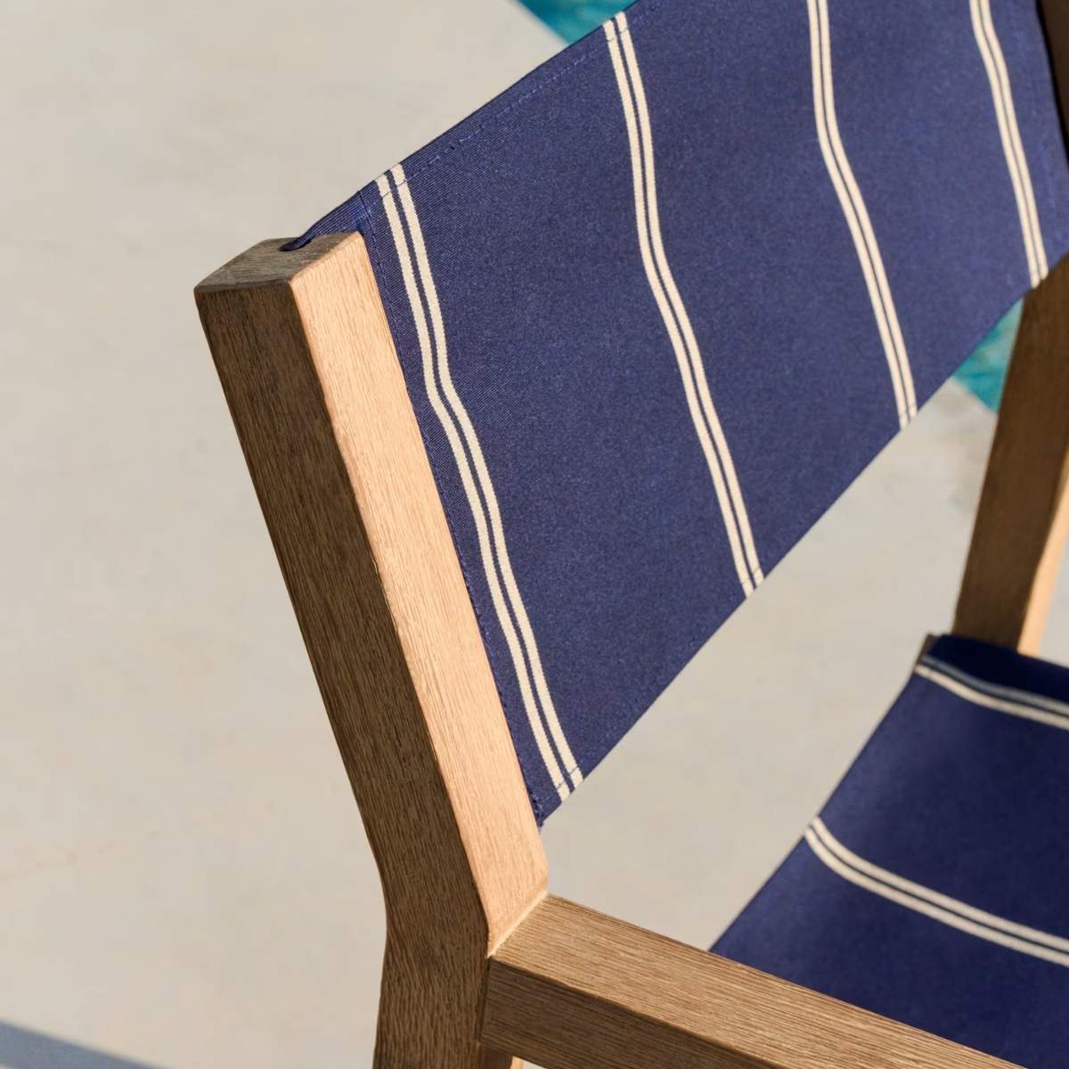 Kave Home Vilara blue and beige striped outdoor folding chair made of FSC 100% solid acacia wood