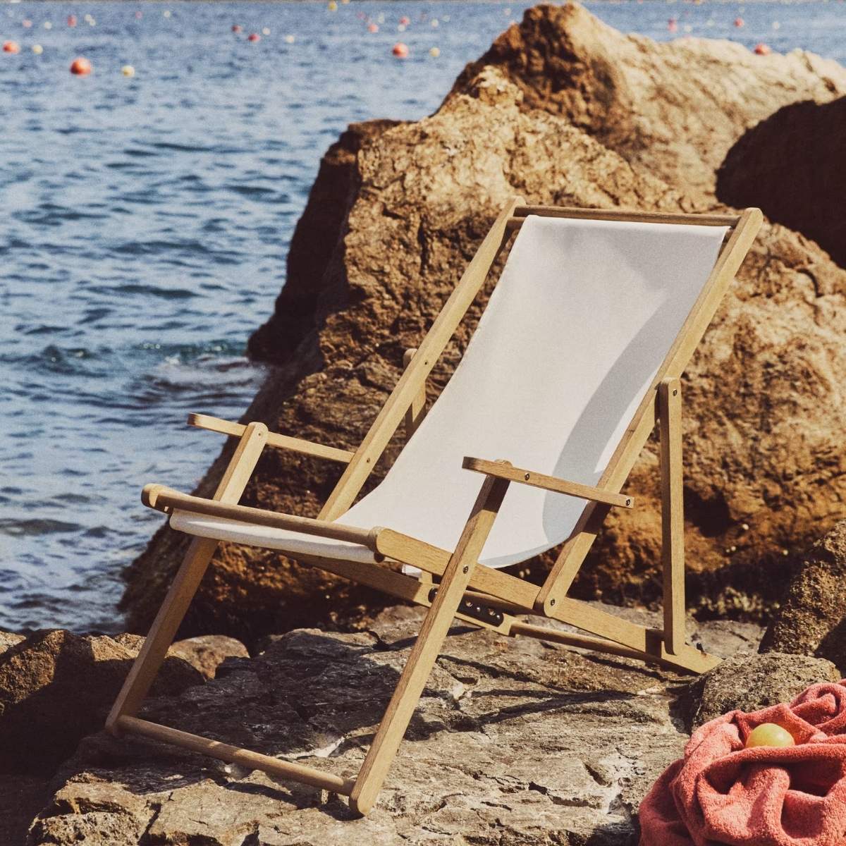 Kave Home Vilara brown and beige striped outdoor folding deck chair made of FSC 100% solid acacia wood