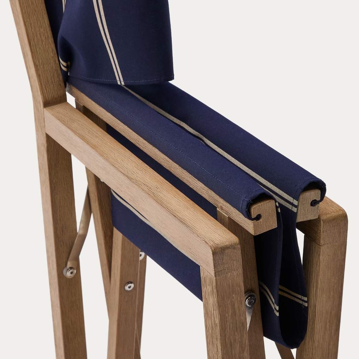 Kave Home Vilara blue and beige striped outdoor folding chair made of FSC 100% solid acacia wood