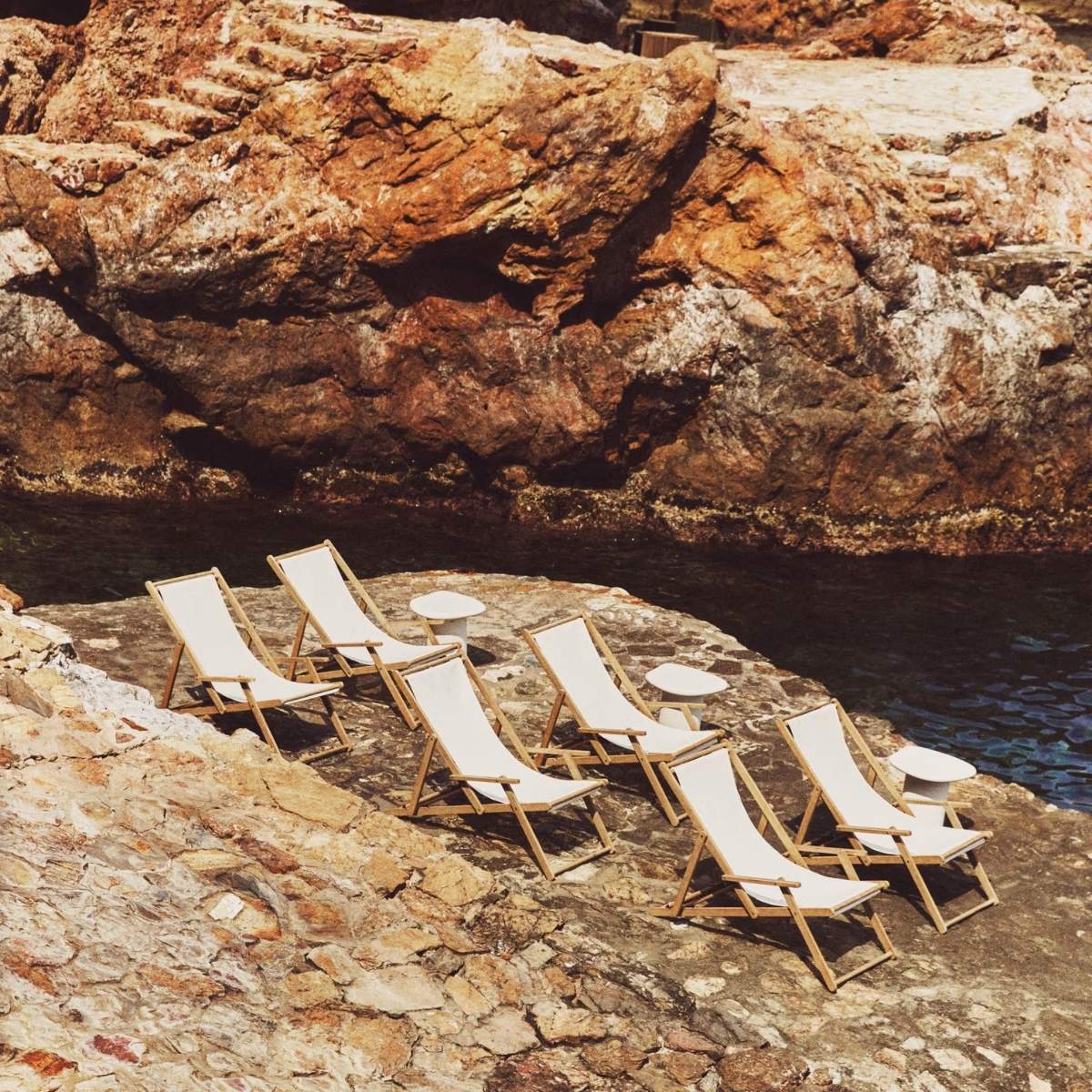 Kave Home Vilara brown and beige striped outdoor folding deck chair made of FSC 100% solid acacia wood
