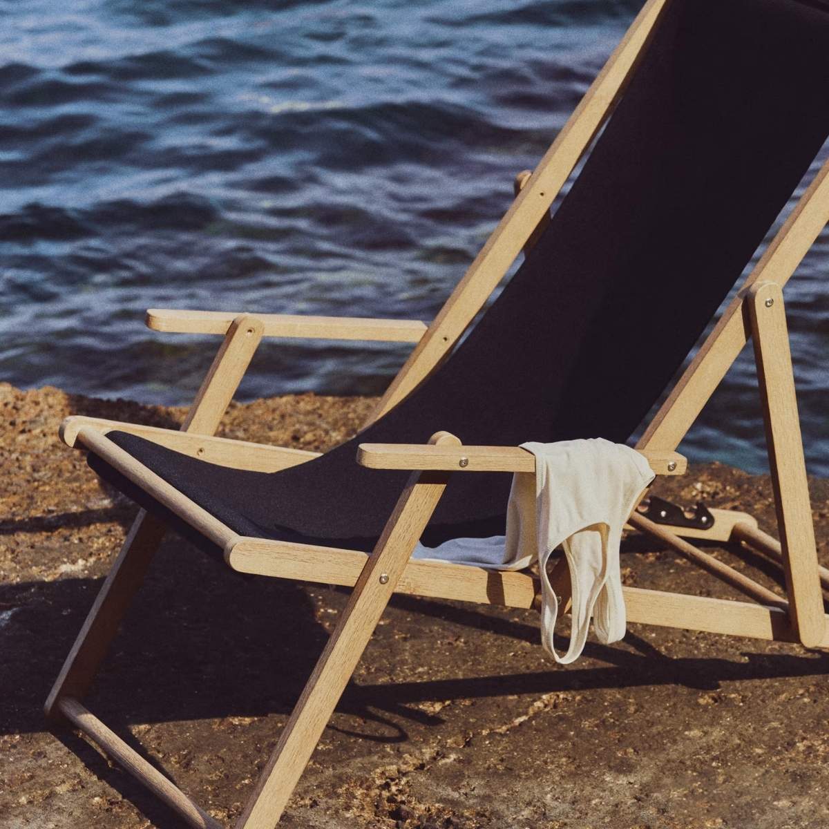 Kave Home Vilara brown and beige striped outdoor folding deck chair made of FSC 100% solid acacia wood