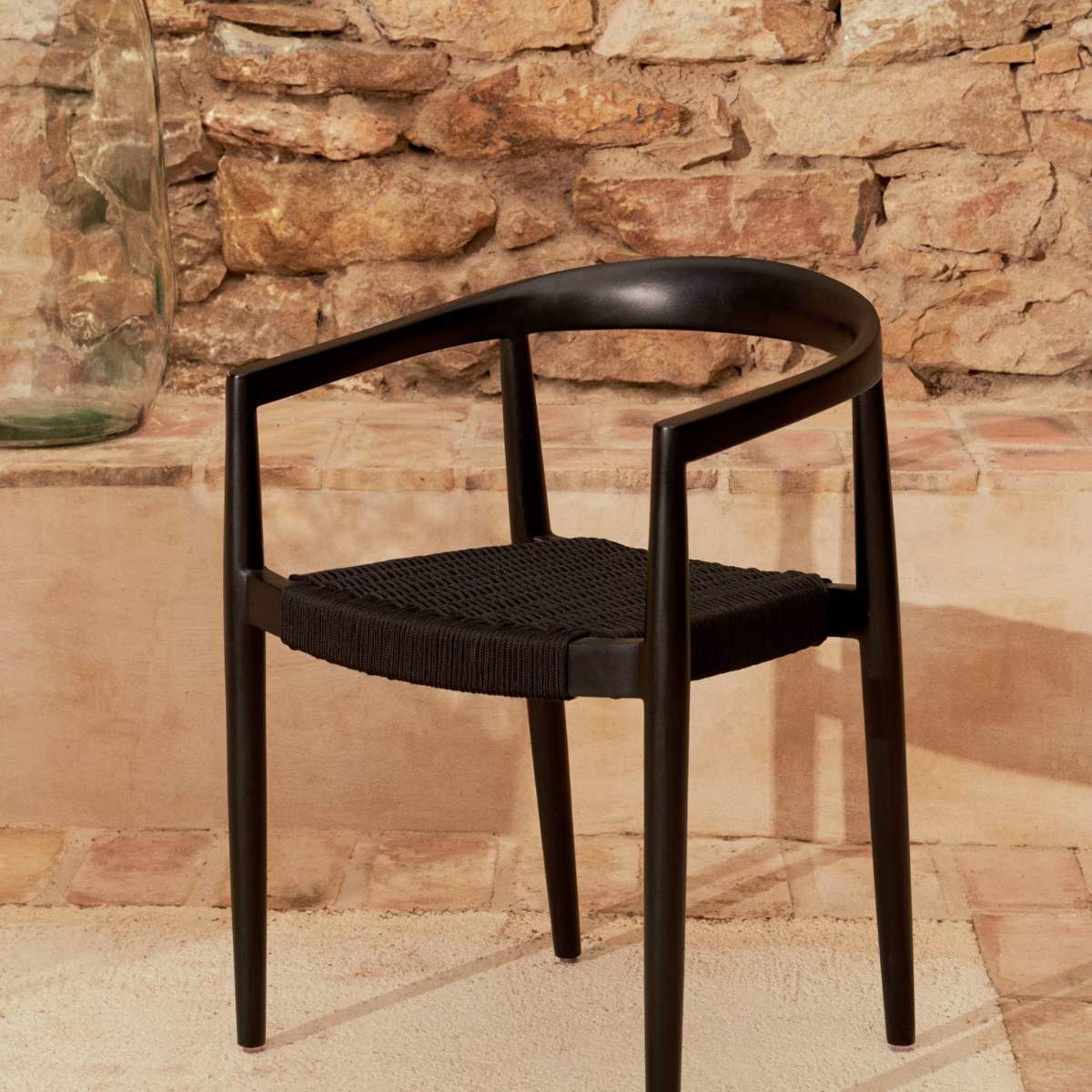Kave Home Ydalia stackable outdoor chair in solid teak wood with natural finish and black rope