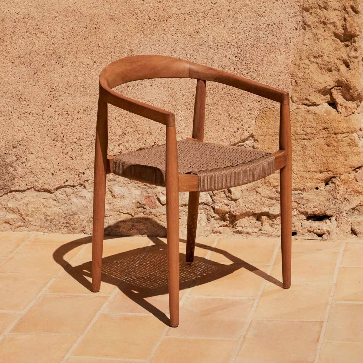 Kave Home Ydalia stackable outdoor chair in solid teak wood with natural finish and black rope